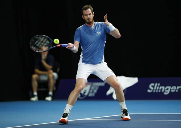 Andy Murray hits a forehand during his win over Liam Broady at the Schroders Battle of the Brits tournament in Roehampton. Picture: Clive Brunskill/Getty