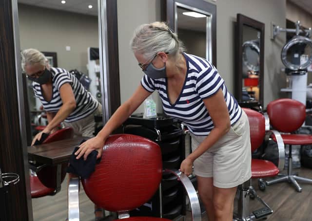 Hairdressers are preparing to welcome customers back to the salon and they may have their work cut out (Picture: Andrew Matthews/PA Wire)