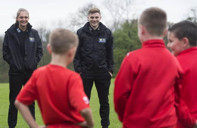 Scotland stars Jenna Fife and James Forrest at a grassroots football event with St Modan’s Community Sports Club in Bannockburn. Picture: Craig Foy/SNS