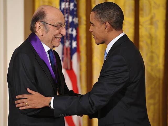 US President Barack Obama shakes hands with graphic designer Milton Glaser after presenting him with the 2009 National Medal of Arts during a ceremony February 25, 2010 (Picture:  MANDEL NGAN/AFP via Getty Images)