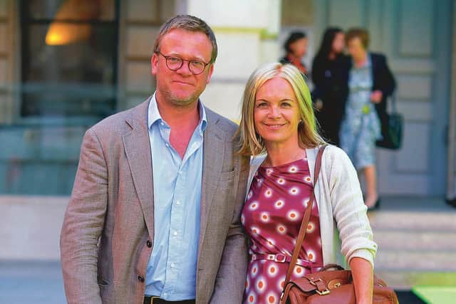 With husband, human rights lawyer Jason McCue, with whom she has been working from home in lockdown in Somerset, where they live with their teenage children. Attending the Royal Academy of Arts Summer Party, 2013. Picture: Alan Davidson/Shutterstock