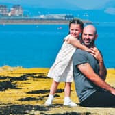 John Harkins and his four-year-old daughter Sophia in Greenock. Picture: John Devlin