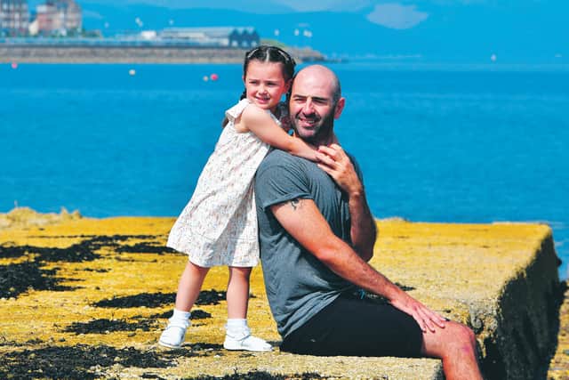 John Harkins and his four-year-old daughter Sophia in Greenock. Picture: John Devlin