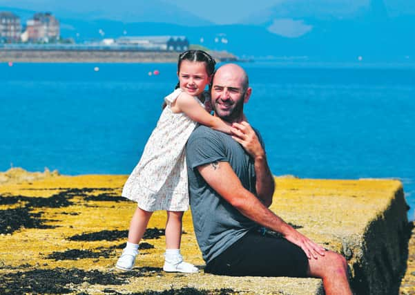 John Harkins and his four-year-old daughter Sophia in Greenock. Picture: John Devlin