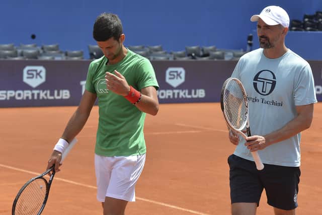 Goran Ivanisevic, right, and Novak Djokovic during practice for the Adria Tour. Picture: Zvonko Kucelin/AP