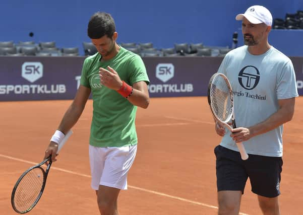 Goran Ivanisevic, right, and Novak Djokovic during practice for the Adria Tour. Picture: Zvonko Kucelin/AP