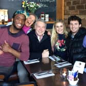 Scott Hastings and his wife Jenny pose for a family photo with, from the right, their son Corey, daughter Kerry-Anne and, far left, Corey’s husband Daniel.