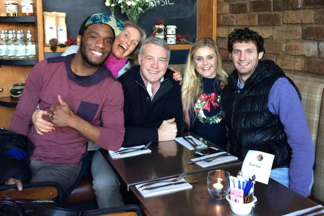 Scott Hastings and his wife Jenny pose for a family photo with, from the right, their son Corey, daughter Kerry-Anne and, far left, Corey’s husband Daniel.