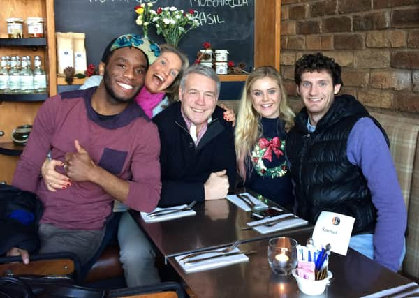 Scott Hastings and his wife Jenny pose for a family photo with, from the right, their son Corey, daughter Kerry-Anne and, far left, Corey’s husband Daniel.