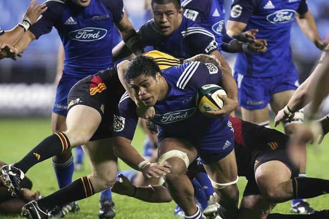 Nick Williams of the Blues is tackled by Scott Linklater of the Chiefs during a Super 14 match in which space was at a premium. Picture: Getty.