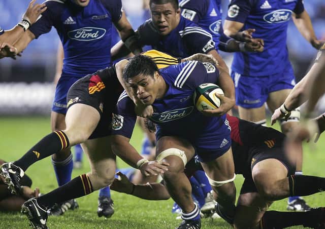 Nick Williams of the Blues is tackled by Scott Linklater of the Chiefs during a Super 14 match in which space was at a premium. Picture: Getty.