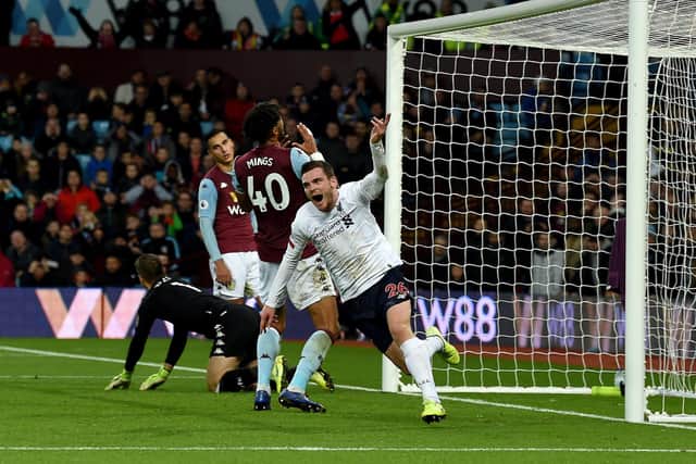 Andy Robertson turns away in delight after scoring Liverpool’s equaliser during their 2-1 victory at Aston Villa in November. Picture: Getty.