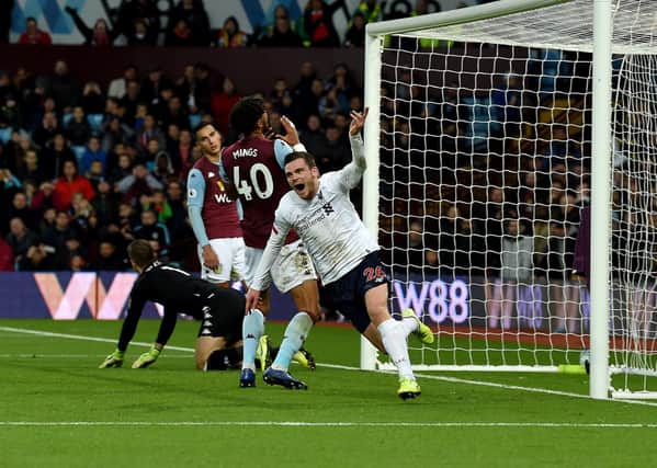 Andy Robertson turns away in delight after scoring Liverpool’s equaliser during their 2-1 victory at Aston Villa in November. Picture: Getty.