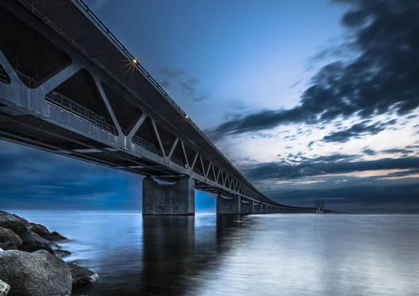 One model suggests a similar construction to the 
Oresund Bridge, the world's longest cable-stayed bridge connecting Copenhagen with Malmo, Denmark, Sweden
 Photo by Daniel Krehe/Shutterstock