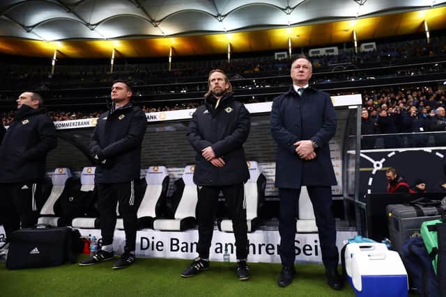 Austin MacPhee, third left, stands alongside Michael O’Neill with whom he worked in the Northern Ireland set-up. Picture: James Marsh/BPI/Shutterstock