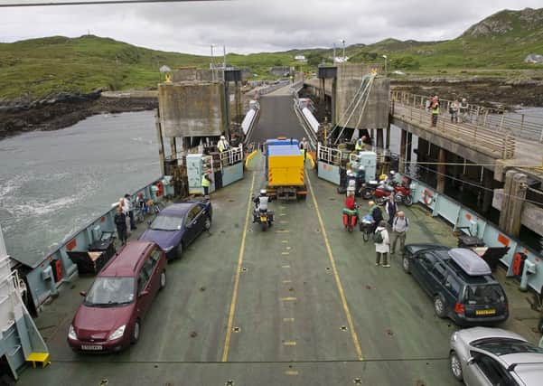 Cars leaving Calmac ferry, Scalasaig harbour, Isle of Colonsay. Picture by Photofusion/Shutterstock
