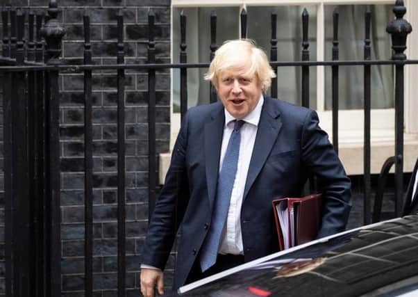 LONDON, ENGLAND - JULY 01: British Prime Minister Boris Johnson leaves 10 Downing Street to attend the weekly Prime Ministers Questions on July 01, 2020 in London, England. (Photo by Dan Kitwood/Getty Images)