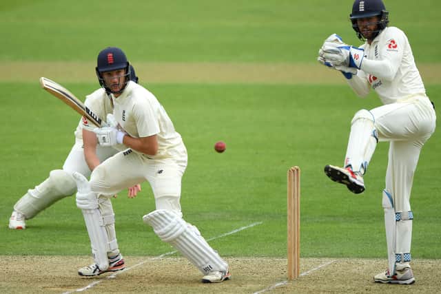 Batsman James Bracey flicks the ball away as wicketkeeper Ben Foakes watches from behind the stumps at the Ageas Bowl. Picture: Stu Forster/Getty