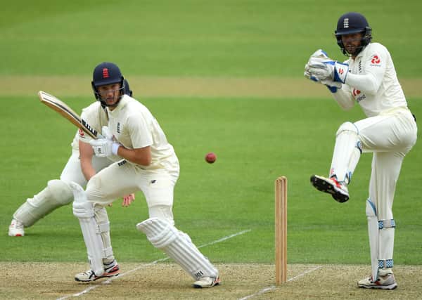 Batsman James Bracey flicks the ball away as wicketkeeper Ben Foakes watches from behind the stumps at the Ageas Bowl. Picture: Stu Forster/Getty