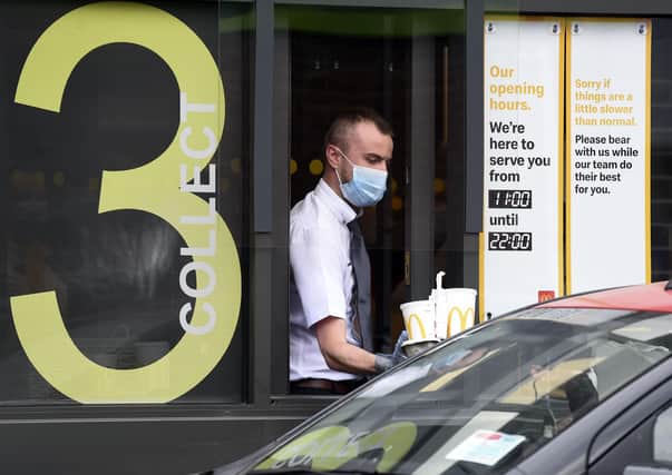 A McDonald's drive-thru at Newbridge. Hospitality workers have a lifetime of playing 'catch-up' on their retirement savings, according to Scottish Widows