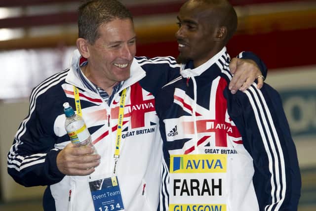 Ian Stewart shares a joke with then 5,000m world champion Mo Farah in 2012. Picture: SNS