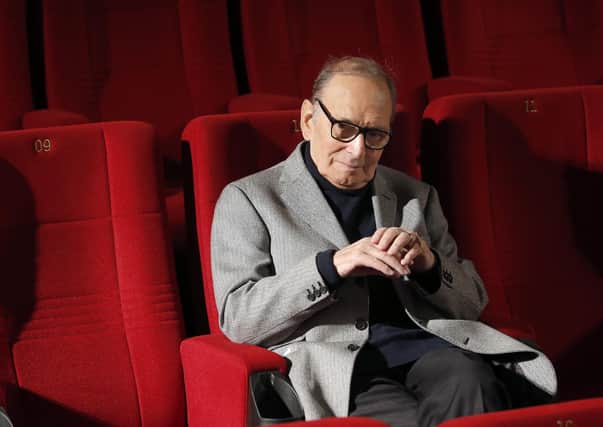 Italian composer Ennio Morricone poses during a photo call to promote his German 2014 concerts in Berlin, Germany. Picture: AP Photo/Michael Sohn