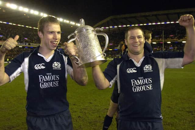 Andrew Henderson and Bruce Douglas, right, with the Calcutta cup after Scotland's win over England in 2006