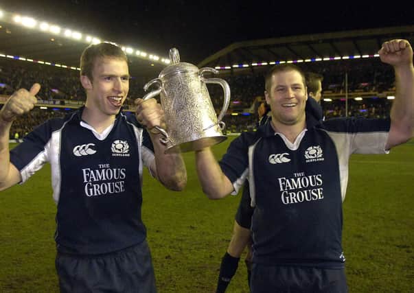 Andrew Henderson and Bruce Douglas, right, with the Calcutta cup after Scotland's win over England in 2006