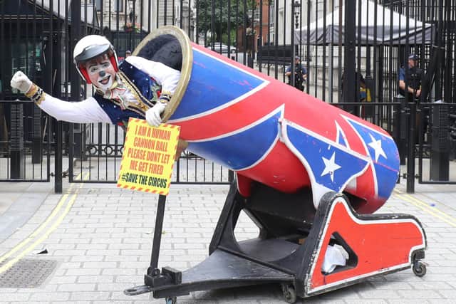 A human cannon ball with fellow circus performers from the Association of Circus Proprietors deliver a petition to Downing Street, London, calling for the right to reopen ahead of the busy summer season. Picture: Gareth Fuller/PA Wire