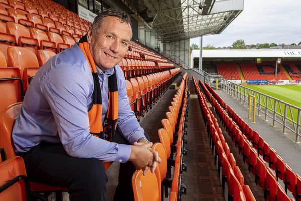 Micky Mellon sports his new colours at Tannadice.