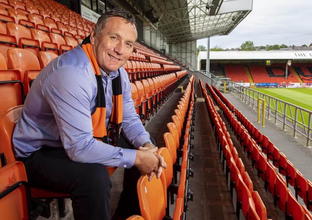 Micky Mellon sports his new colours at Tannadice.