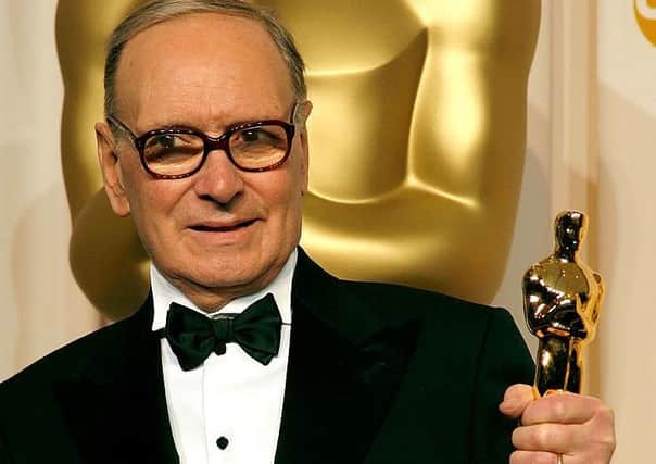 Composer Ennio Morricone poses with his Honorary award at the 79th Annual Academy Awards in 2007 (Picture: Vince Bucci/Getty Images)