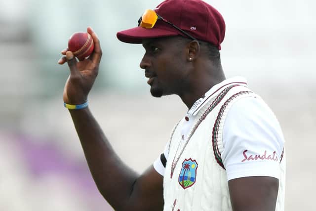 West Indies captain Jason Holder leaves the field after taking six wickets against England. Picture: Stu Forster/Getty