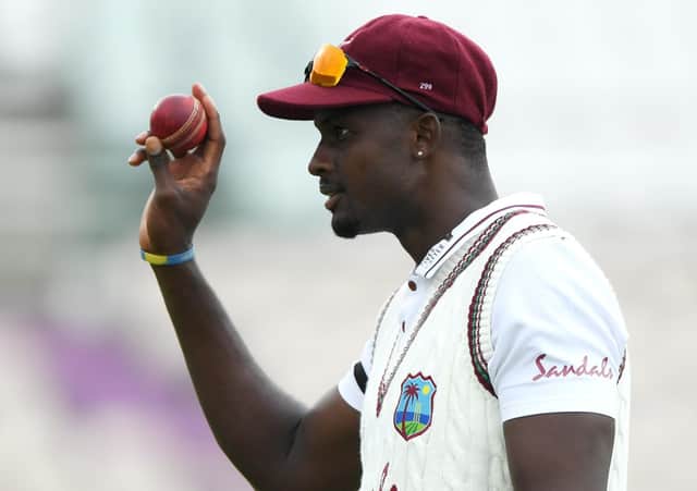 West Indies captain Jason Holder leaves the field after taking six wickets against England. Picture: Stu Forster/Getty