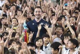 As he discovered during a trip to Meishin Elementary School in Kobe at the Rugby World Cup last year, Laidlaw already has a bit of a cult following in Japan. Picture: Gary Hutchison/SNS
