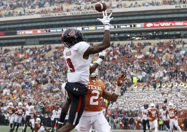 Texas Tech Red Raiders versus Texas Longhorns from November last year – a typical college football match in the US played in front of packed stadiums. Picture: Tim Warner/Getty Images