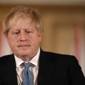 LONDON, ENGLAND - MARCH 17: British Prime Minister Boris Johnson gives a press conference about the ongoing situation with the coronavirus (COVID-19) outbreak inside 10 Downing Street on March 17, 2020 in London, England. For most people, the new coronavirus causes only mild or moderate symptoms, such as fever and cough. For some, especially older adults and people with existing health problems, it can cause more severe illness, including pneumonia. (Photo by Matt Dunham - WPA Pool/Getty Images)