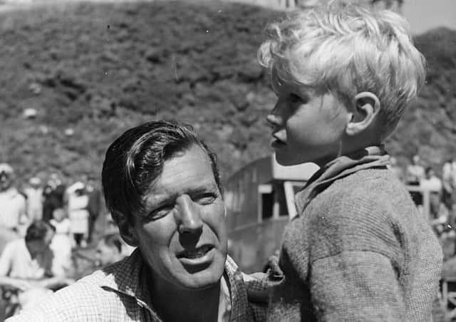 circa 1951: Six-year-old child star Jon Whiteley with director Charles Crichton (1910 - 1999). The two are working together on 'Hunted', an Independent Artists film also starring Dirk Bogarde. (Photo by Hulton Archive/Getty Images)