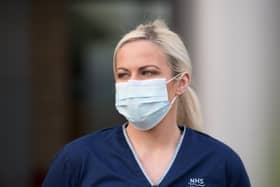 Masks are not a guarantee against infection and some fear they could provide false reassurance, encouraging people to engage in more risky behaviour (Picture: John Devlin)