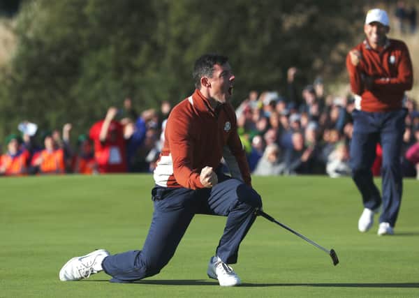 Rory McIlroy celebrates holing a putt in front of huge galleries on the fifth green during the Fourballs match on day two of the 2018 Ryder Cup at Le Golf National in Paris. Picture: David Davies/PA Wire.