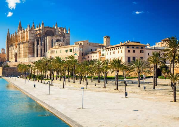 Holiday in the sun? The Cathedral of Santa Maria in Majorca (Picture: Anita Bonita/Getty)