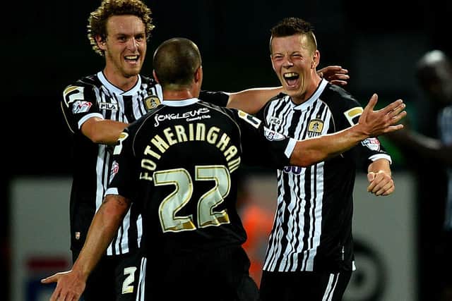 Callum McGregor celebrates scoring for Notts County in a Capital One Cup match in 2013