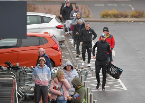 Customers at Aldi in Camelon observe social distancing in the queue, but is two metres the right distance, asks Stephen Jardine.