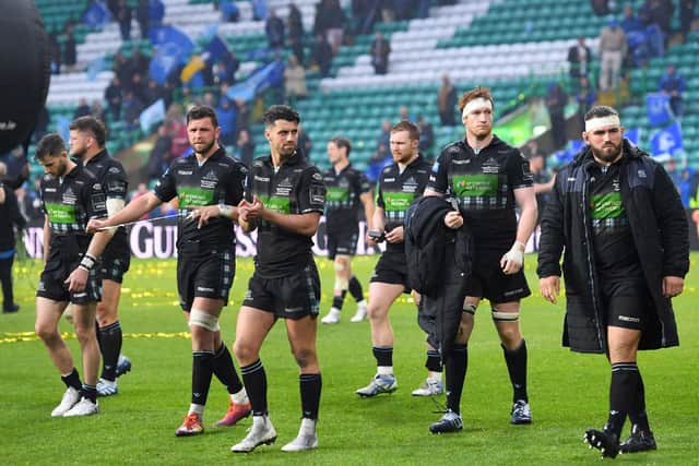 Dejected Glasgow Warriors players leave the field after acknowledging their fans following defeat by Leinster at Celtic Park in the 2019 Guinness Pro 14 final. Picture: SNS/SRU