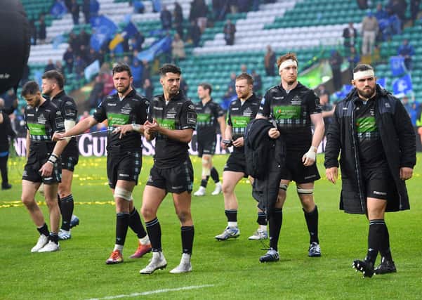 Dejected Glasgow Warriors players leave the field after acknowledging  their fans following defeat by Leinster at Celtic Park in the 2019 Guinness Pro 14 final. Picture: SNS/SRU