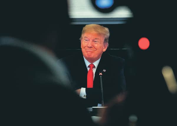 President Trump faces questions on developments in Minneapolis in front of the media in Washington, DC. Picture: Erin Schaff-Pool/Getty