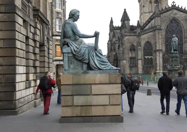 David Hume’s statue on the Royal Mile in Edinburgh. Hume believed people were driven more by their passions than by reason – a position supported by cognitive bias research in behavioural economics (Picture: Robert Perry)