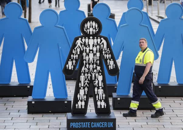A symbolic installation featuring statues of eight giant men in  Glasgow in 2018