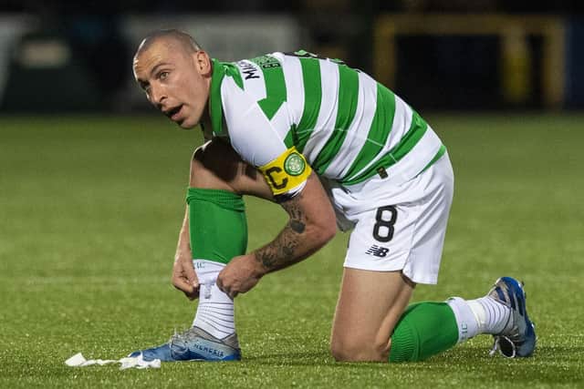 Celtic captain Scott Brown has been watching the return to action in Germany on TV and found it odd hearing players' voices echoing in empty stadiums. Picture: SNS.