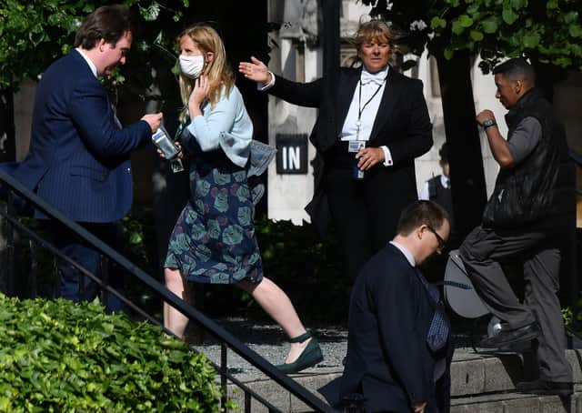 MPs queue in a Commons courtyard to vote on Tuesday (Picture: Justin Tallis/AFP via Getty Images)